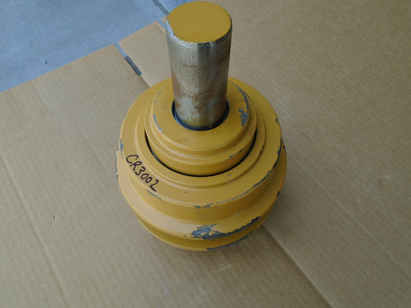 CR3002 John Deere 450 455 550 555 Clamp Style Top Carrier Roller